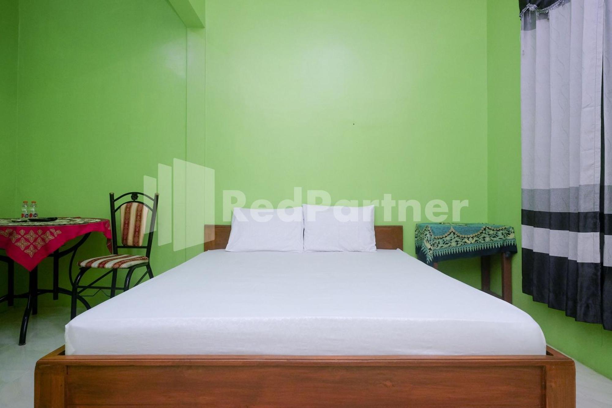 Giri Mulyo B Near Grojogan Sewu Mitra Reddoorz Hotel