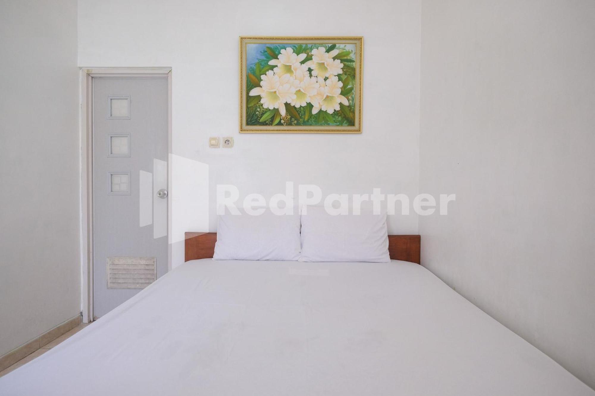 Giri Mulyo B Near Grojogan Sewu Mitra Reddoorz Hotel 2*